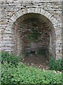 NY7458 : Left hand arch of the lime kiln below Dykerow Fell by Mike Quinn