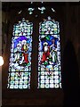 The window in the tower of Poughill church