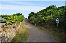 SS4545 : A footpath by the cemetery which leads onto National Trust property by Roger A Smith