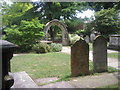 Tombs and archway in St Mary the Virgin Churchyard, Mortlake