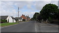 NY2256 : Road heading through Kirkbride in Cumbria by James Denham