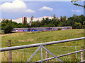 Train Passing Stakehill Industrial Estate