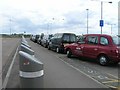 TL1121 : Taxi rank, Luton Airport by David P Howard
