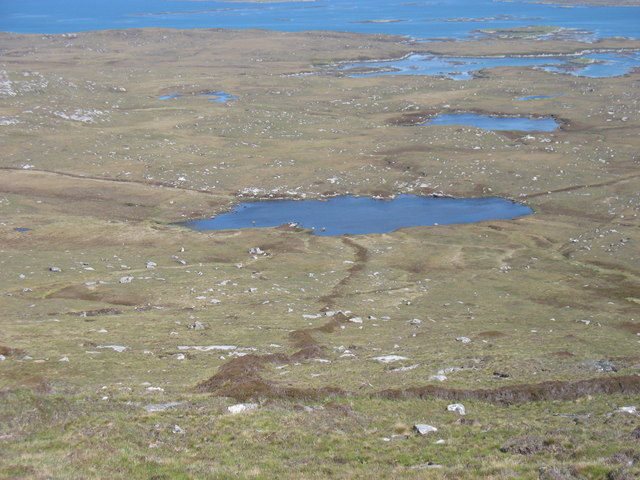 Loch Dubh na Moine Taken from the east slopes of Beinn Mhor. What was presumably an old enclosure boundary leads down to the loch.