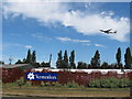 Garden centre near Heathrow, with airliner above