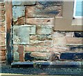 NY3955 : Benchmark on Hall in West Walls by Roger Templeman