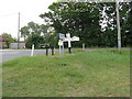 Signpost at the junction of the B2192 and Palehouse Common road