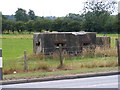 TM3560 : Pillbox, off the A12 Main Road. Stratford St.Andrew by Geographer