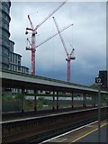TQ0058 : Cranes outside Woking station by David Smith