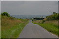 Minor road heading past Arch Cottage