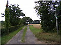 TM3662 : Footpath to Benhall Low Road & entrance to Kelton Cottage by Geographer