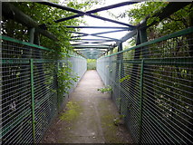 SK3775 : Footbridge over railway line by Peter Barr