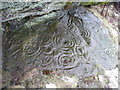 NU0729 : Cup & Ring rock carvings in Ketley Crag rock shelter by Anne Patterson