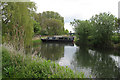 Wedged narrowboat across the Lark