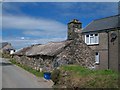 Former cottage and farmbuildings on Lon Fudr