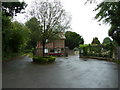 Mini-roundabout opposite Hill Cemetery Lodge