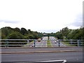 The M57 is crossed by the Liverpool Manchester railway