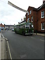 Vintage bus passing the Market Place