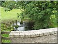 Burn over parapet of Barnboard Mill Bridge