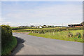 Road junction and farms near Quarter