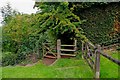 Gate from church grounds onto public footpath