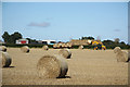 Collecting straw bales