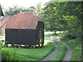SU6748 : Small barn on staddle stones by don cload