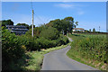 Road heading past Castell-y-geifr farm