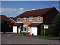 Houses at the junction of Beaumaris Close and Parkhill Drive