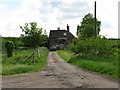 Ponds Cottages on track to Woolton Farm