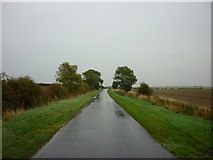 TA2035 : Looking east along Pasture Lane towards the B1238 by Ian S