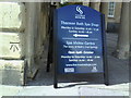 Benchmark and sign at Thermae Bath