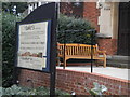 Notice board and bench, St Luke