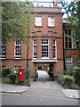 Postbox and archway, Kidderpore Avenue NW3