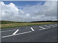 Junction of A 487 and minor road at Pointz Castle, Pembrokeshire