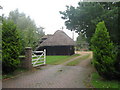 Thatched barn of Bliby Cottage