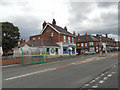 Bus stop outside Goodies Chips, High St, Tansey Green