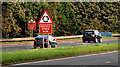 J2459 : Roundabout signs, Hillsborough bypass by Albert Bridge