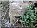 Dry Doddington church bench mark