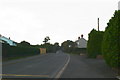 The main road through Commins Coch