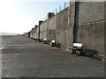 Seafront walk and benches, Seaford, looking west