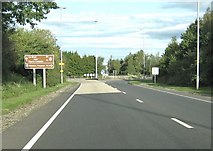 NX9877 : Roundabout at the junction of the A75 and the A701 by Ann Cook