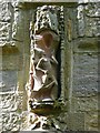 NU2322 : Carving over the porch doorway door of Holy Trinity Church, Embleton by Humphrey Bolton