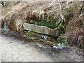 Stone trough on the side of the old access road to Blackpits Mill