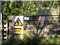 Signs on the parapet of Bridge ILK1/3, Woodlands Drive