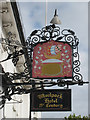 The Woolpack Hotel sign