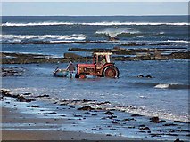 NU2614 : Hauling in the boat, Boulmer by Oliver Dixon