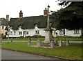 War Memorial and thatched cottages at South Lopham