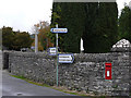 Signpost and postbox, Llanafan