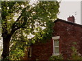 End terrace in Playfair Street, Moss Side, Manchester